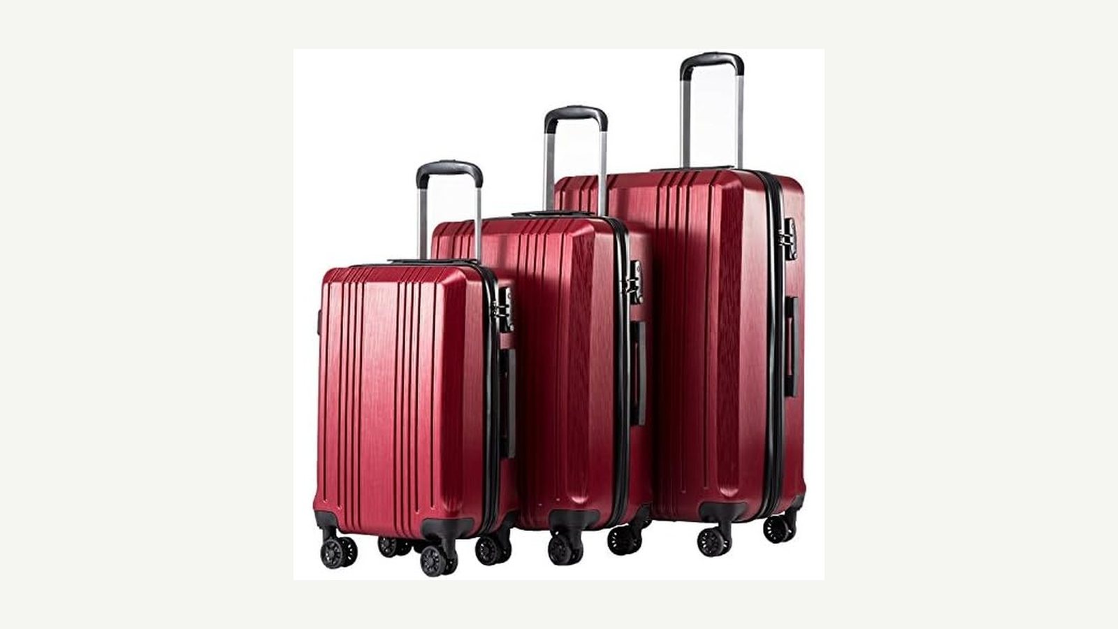 A hardshell carry-on suitcase on spinner wheels with the telescoping handle extended